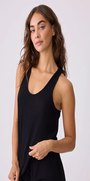 Racer-back tank top features lace accents Shelf bra for added comfort and support 96% Modal 4% - Elastane Machine Wash Cold. Do Not Bleach. Tumble Dry Low. Imported Color Black