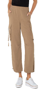 25-1/2" Inseam
Mid-rise
10-1/4" Front rise; 20" Leg opening
Pull-on with elastic back waistband
Slash side pockets
Side cargo pockets; D-ring tab detail on right pocket
Adjustable cinched hem
Color: Palo Santo
100% Polyester
Machine Wash Cold with Like Colors, Wash Inside Out, Only Non-Chlorine Bleach When Needed, Tumble Dry Low, Warm Iron If Needed, Or Dry Clean