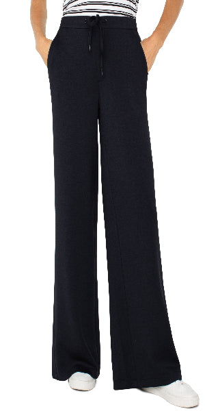 Color: Blk
Pull-on
Wide leg crop
Elastic waistband with tie front
Slant front pockets; No back pockets